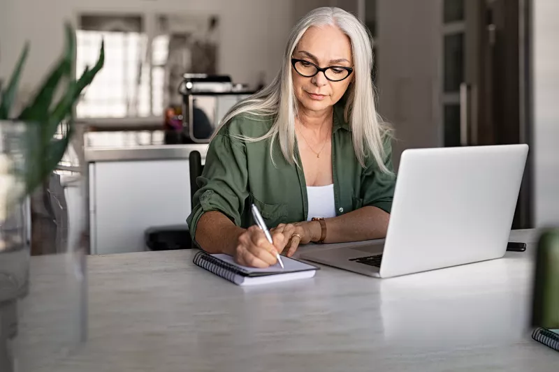 A woman doing research online.